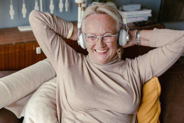 istock Senior woman enjoying at home 1356372727