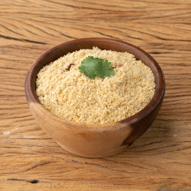 istock Farofa, typical brazilian manioc flour side dish over wooden table 1356374438