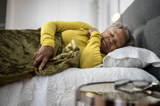 Senior woman sleeping at home