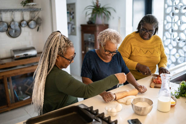 istock Senior women baking at home 1356378234