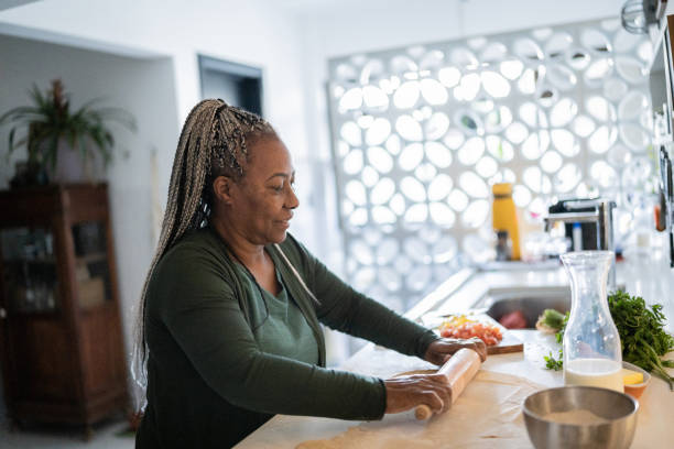 Senior woman baking at home