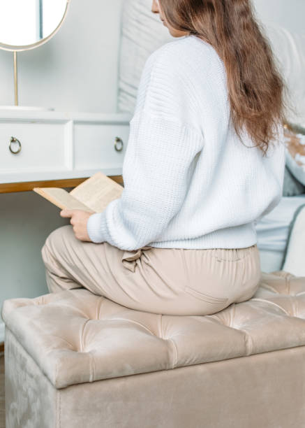 istock a girl in a bright room 1356378294