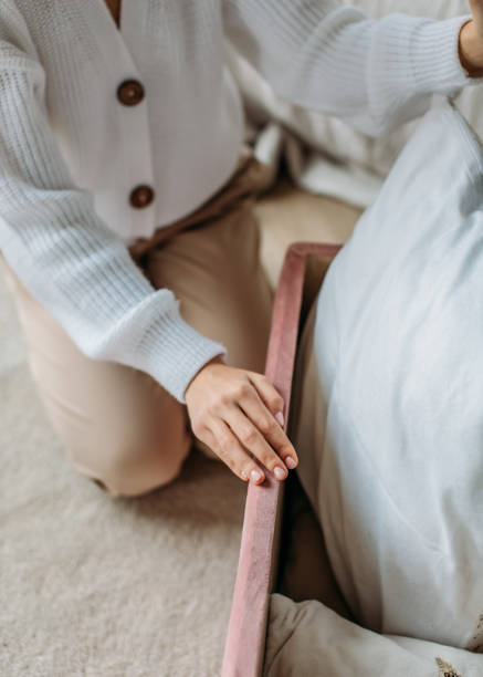 istock a girl in a bright room 1356378529