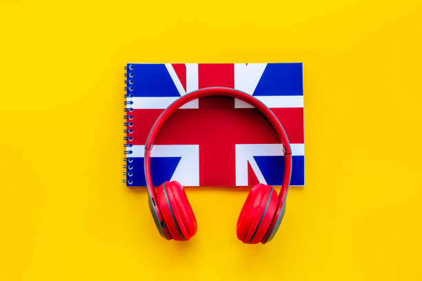 istock English courses concept. British flag on notebook and headphones 1356378710