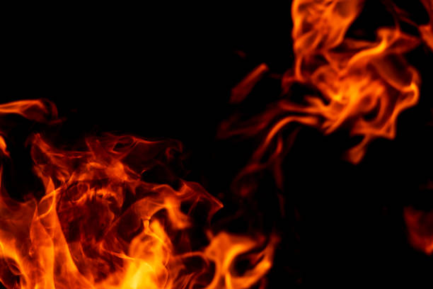 istock Abstract flame, fire flame texture, background. Tongues of fire on a dark background 1356384080