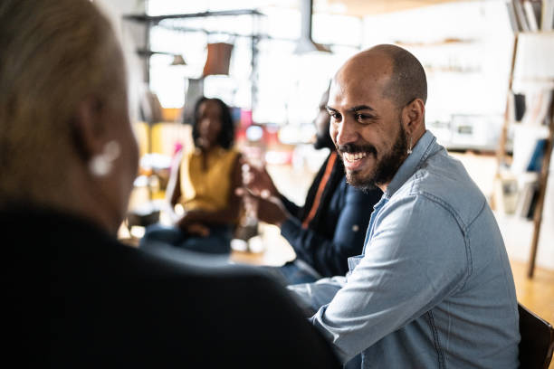 Coworkers talking on a meeting