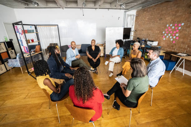 istock People in a meeting or group therapy 1356385646