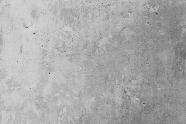 istock Loft-style plaster walls, gray, white, empty space used as wallpaper. Popular in home design or interior design. with copy spaces. 1356388082