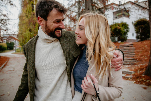 istock Romantic embrace in the park 1356388839