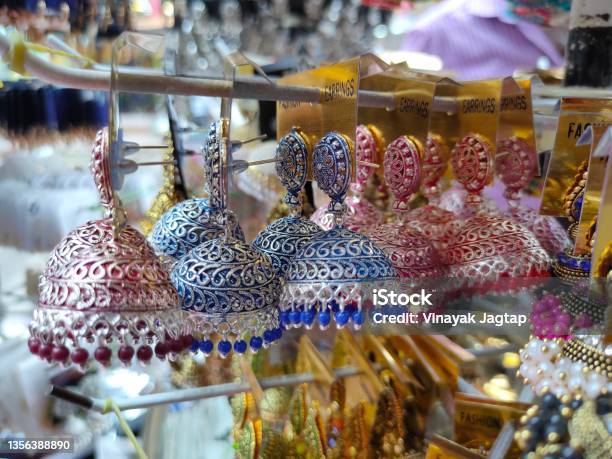 30 Nov 2021 Indian Traditional Earrings Is Displayed In A Street Shop For Sale In Pune Maharashtra Indian Art Indian Traditional Jewelry Stock Photo - Download Image Now