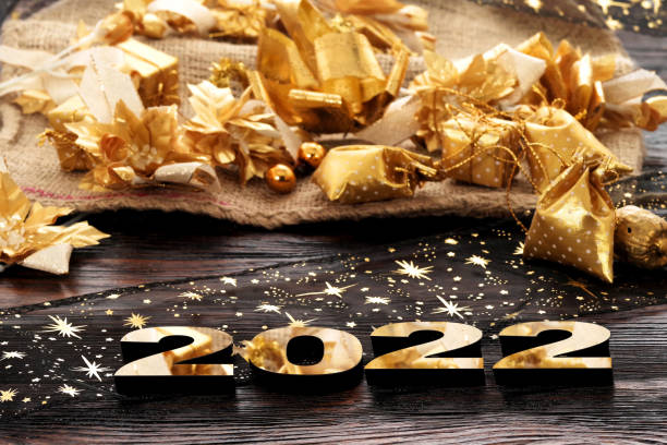istock Happy New Year. Symbol from number 2022 on abstract background 1356391921