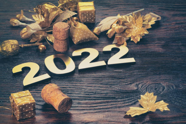 istock Happy New Year. Symbol from number 2022 on abstract background 1356392026