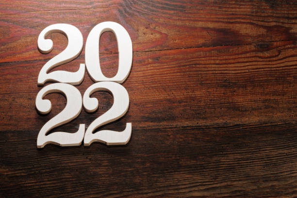 istock Happy New Year. Symbol from number 2022 on abstract background 1356392708
