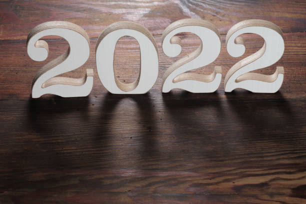 istock Happy New Year. Symbol from number 2022 on abstract background 1356392822