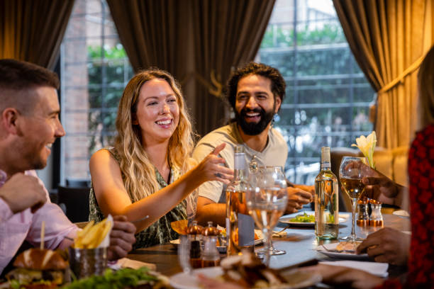 istock Friends Out For a Meal 1356393350