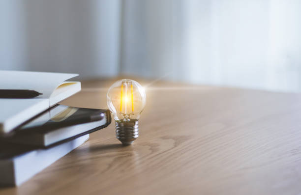 istock Bright lamp. Business working success or education learning idea 1356394604