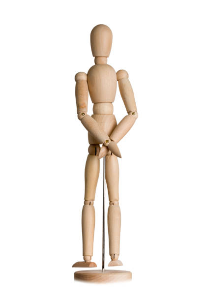 istock wooden mannequin joined hands behind back, prisoner isolated on white 1356395628