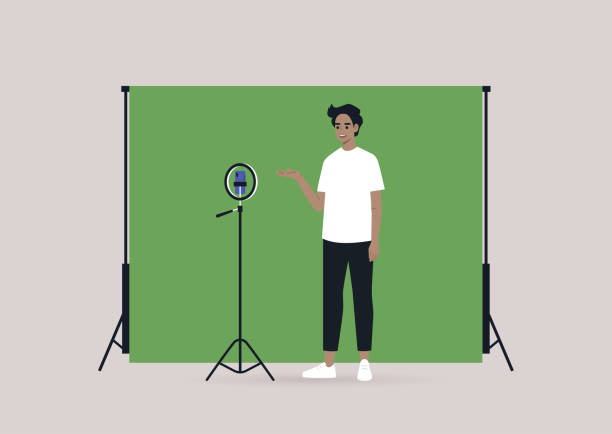 illustrazioni stock, clip art, cartoni animati e icone di tendenza di un giovane blogger caucasico che registra un video con un treppiede, un telefono cellulare e uno schermo chroma key - moving film techniques illustrations