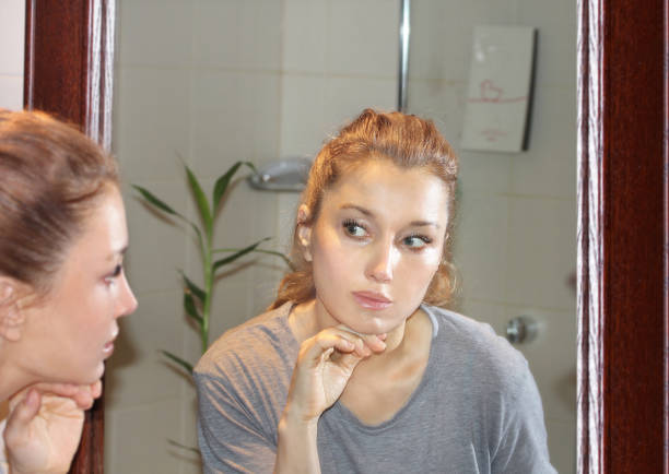 istock Applying the cream..Magic anti-aging cream. 1356397505