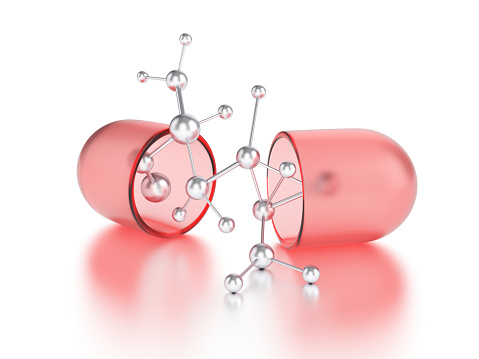 Open capsule or pill with molecular structure. Nanotechnology concept