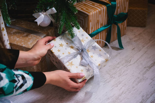 istock Christmas preparations: gifts under the tree 1356398775