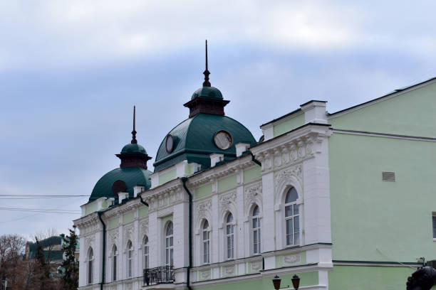 istock An old house with a beautiful facade and turrets on the roofs. 1356401218