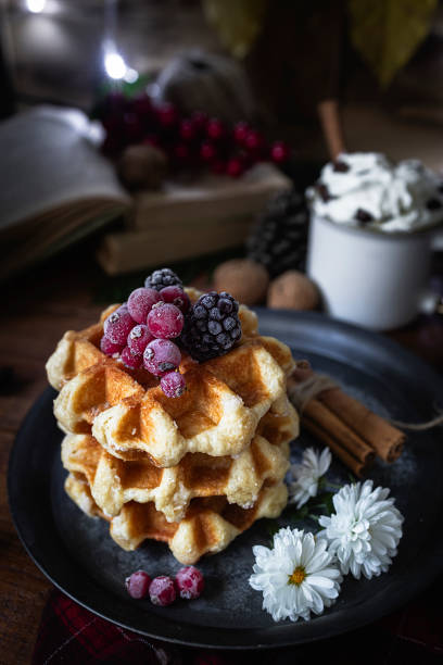 istock Waffles with blackberries and currants. Christmas sweets. 1356402931