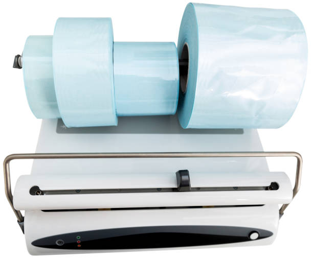 istock Medical sealing machine over white background 1356403835