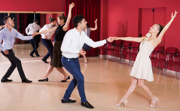 istock People practicing vigorous lindy hop movements 1356404041