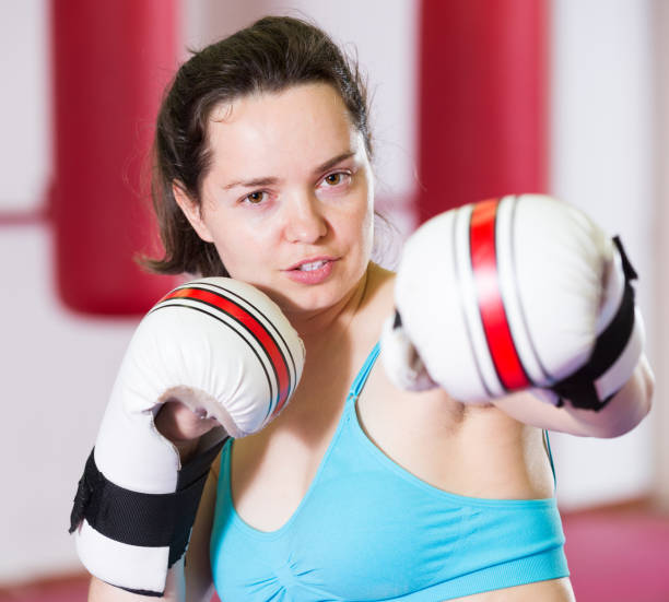 istock Portrait of young woman practicing different kiks 1356404238