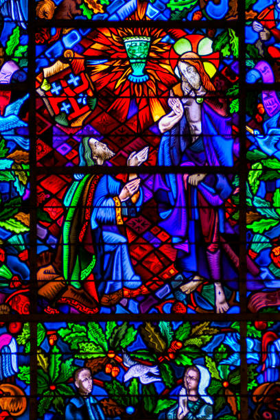 Church of the Grail Stained glass depicting Joseph of Arimathea having a vision of the Holy Grail in the Church of the Grail, Tréhorenteuc, France foret de paimpont stock pictures, royalty-free photos & images