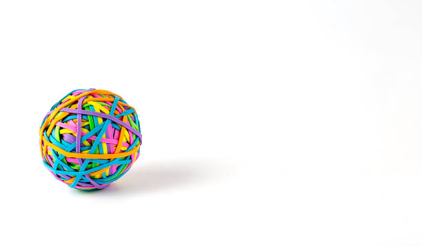 istock Coloured ball of rubber bands isolated on a white background 1356406417