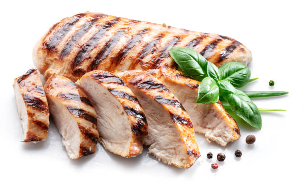 istock Grilled chicken fillet with herbs isolated on white background. 1356410527