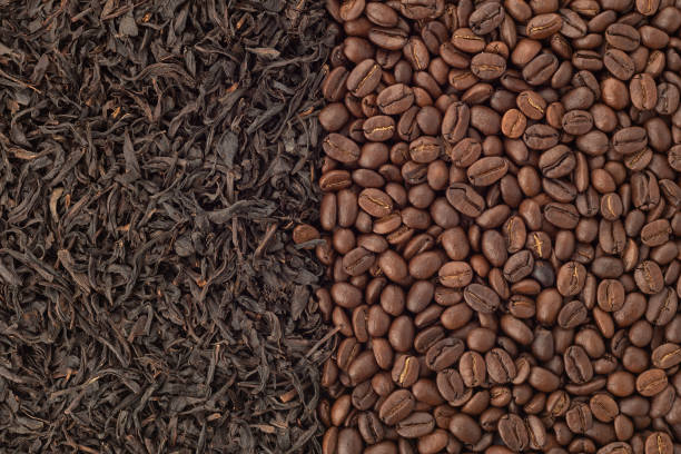 istock Full frame from coffee beans and tea leaves, abstract background. 1356411855