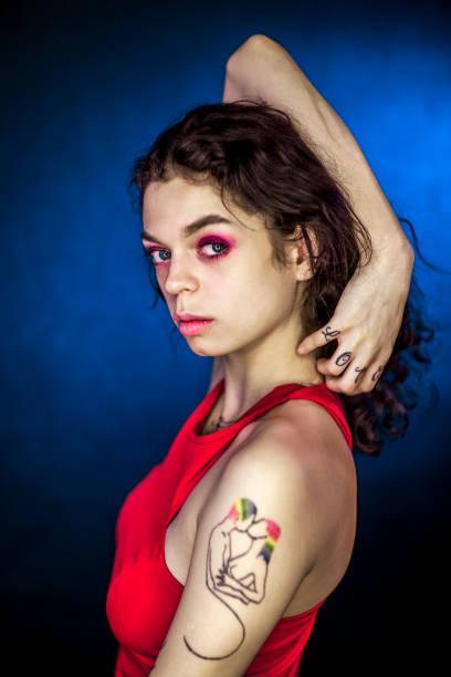 istock Girl with tattoo on arm 1356413207