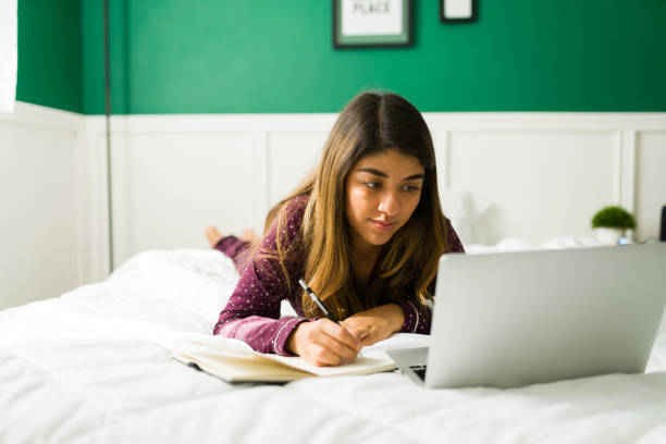 istock Attractive woman working on the laptop 1356413700