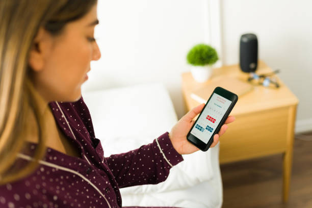 istock Young woman using a health app 1356414463