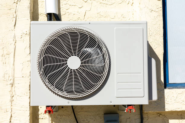 istock Air conditioner unit outdoor condenser installed on building wall facade 1356414603