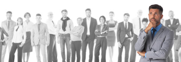 istock Thinking man and business team 1356414725