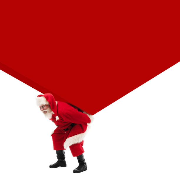 Santa Claus carrying gift box on white stock photo