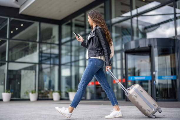 istock Woman at the airport 1356421871
