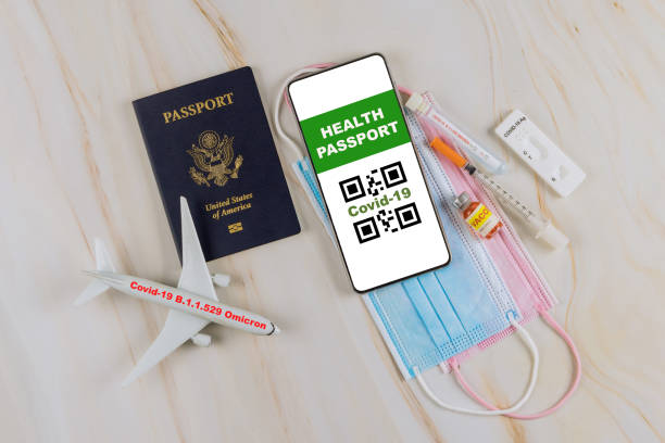 istock Coronavirus vaccination passport for international travelling testing for presence of coronavirus a tube containing a swab sample for new mutation Omicron COVID-19 1356426567
