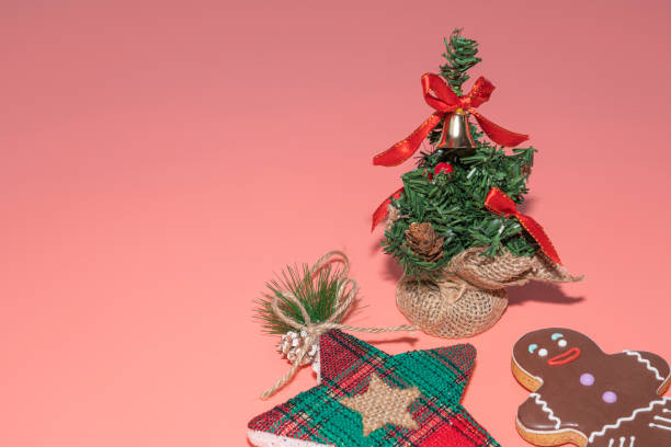 istock christmas toys on a pink background copyspace 1356429171