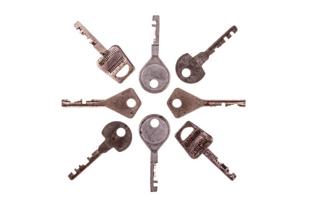 Old vintage keys isolated on white background. Several types of old retro keys. Set of old keys. Composition of different keys.