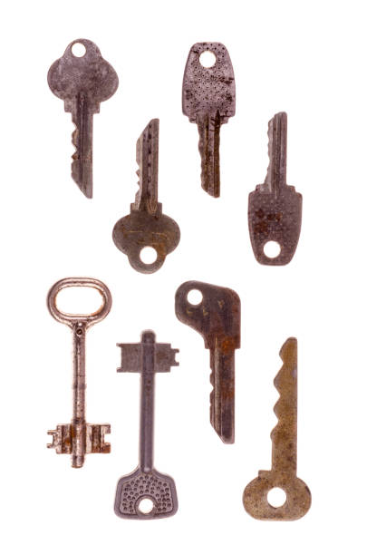 istock Old vintage keys isolated on white background. 1356433463