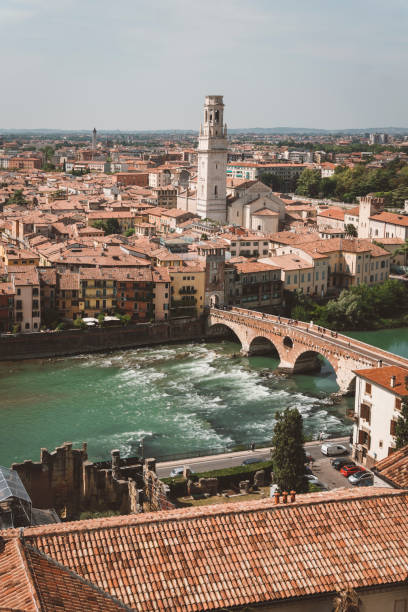Panorama of city of Verona historical quarter from viewpoint, Italy; Roman culture trip in the summer. City of Romeo and Juliet.