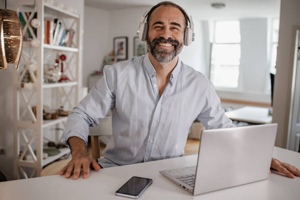 istock Mature man working on the laptop 1356439888
