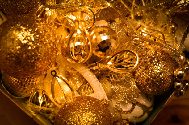istock Golden christmas decorations for tree and home 1356440045