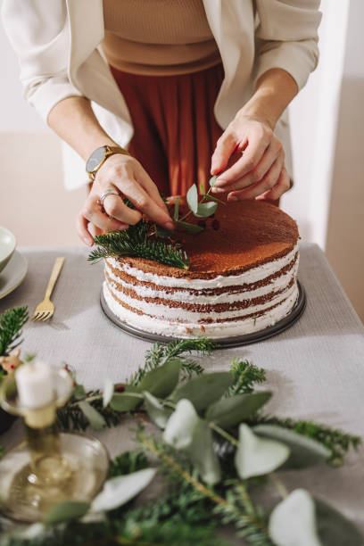 istock New Year's Eve Preparations: An Anonymous Woman Setting Up Christmas Dinner Table 1356441051