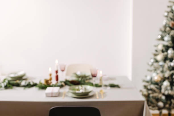 istock New Year's Eve Preparations: Elegant Christmas Table Setting at Home. Defocused shot 1356441053